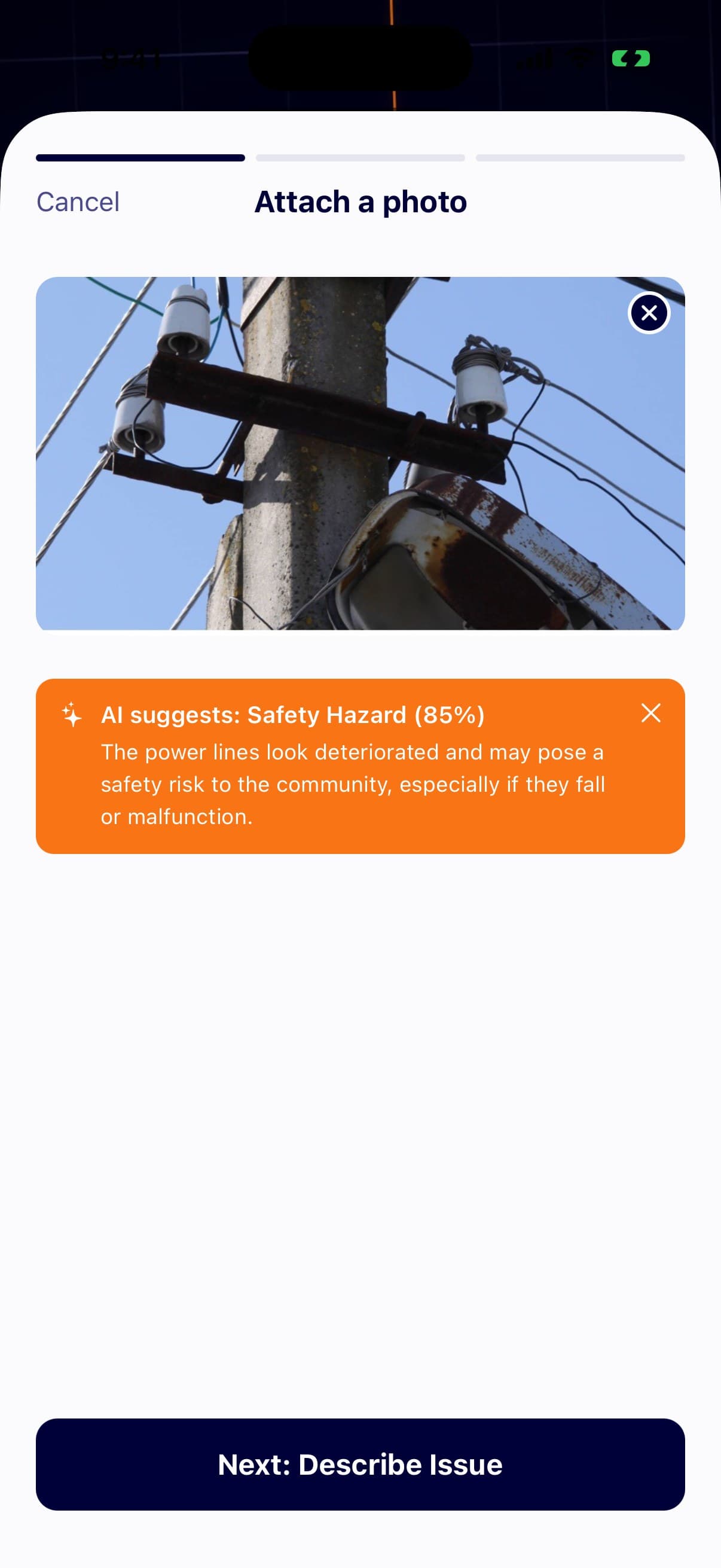 A photo of a damaged power pole with an AI banner suggesting the Safety Hazard category at 85 percent confidence and explaining why